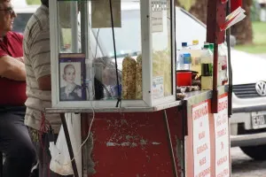 Evita's picture displayed on a popcorn stand.